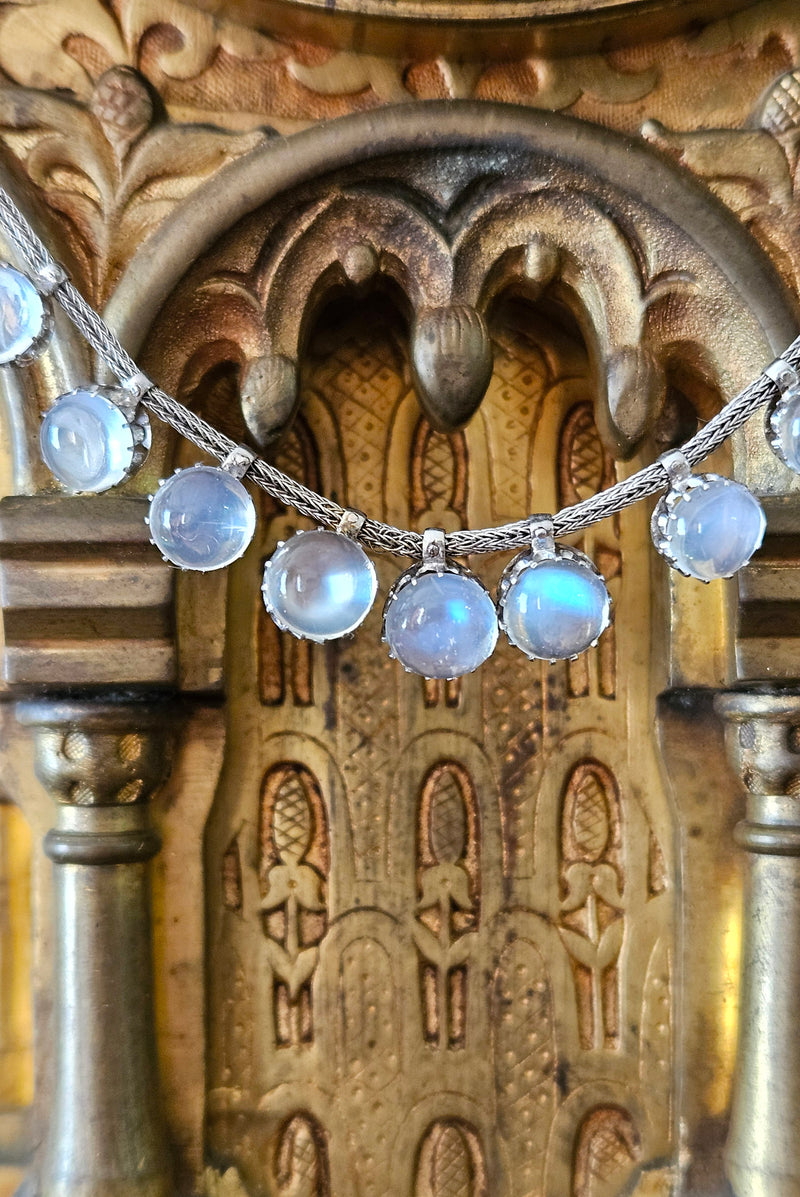 A Victorian Authentic Original Slightly Graduated 23.40ctw Blue Moonstone fringe Roman Woven 10K White Gold Necklace C. 1880s