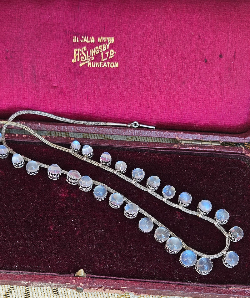 A Victorian Authentic Original Slightly Graduated 23.40ctw Blue Moonstone fringe Roman Woven 10K White Gold Necklace C. 1880s