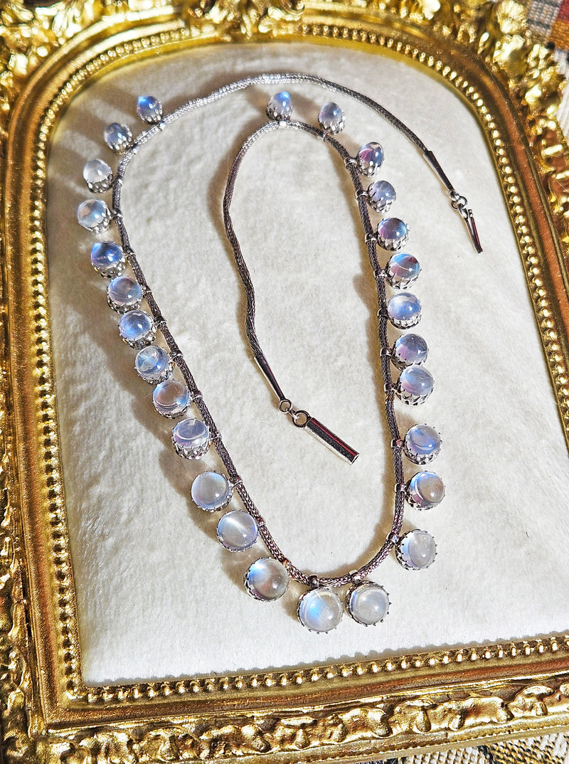 A Victorian Authentic Original Slightly Graduated 23.40ctw Blue Moonstone fringe Roman Woven 10K White Gold Necklace C. 1880s