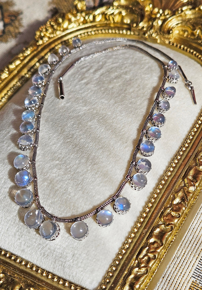 A Victorian Authentic Original Slightly Graduated 23.40ctw Blue Moonstone fringe Roman Woven 10K White Gold Necklace C. 1880s