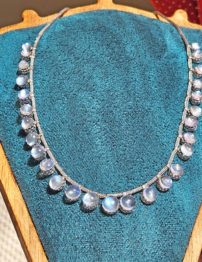 A Victorian Authentic Original Slightly Graduated 23.40ctw Blue Moonstone fringe Roman Woven 10K White Gold Necklace C. 1880s