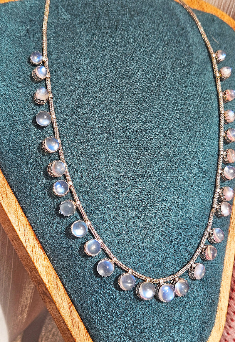 A Victorian Authentic Original Slightly Graduated 23.40ctw Blue Moonstone fringe Roman Woven 10K White Gold Necklace C. 1880s