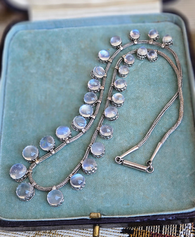 A Victorian Authentic Original Slightly Graduated 23.40ctw Blue Moonstone fringe Roman Woven 10K White Gold Necklace C. 1880s