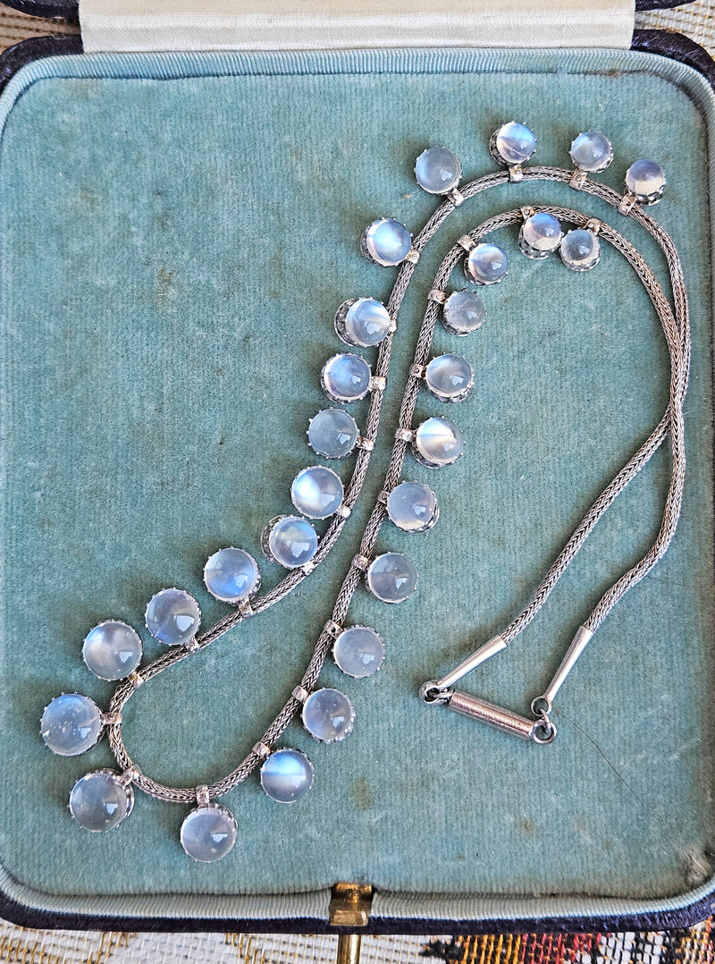 A Victorian Authentic Original Slightly Graduated 23.40ctw Blue Moonstone fringe Roman Woven 10K White Gold Necklace C. 1880s