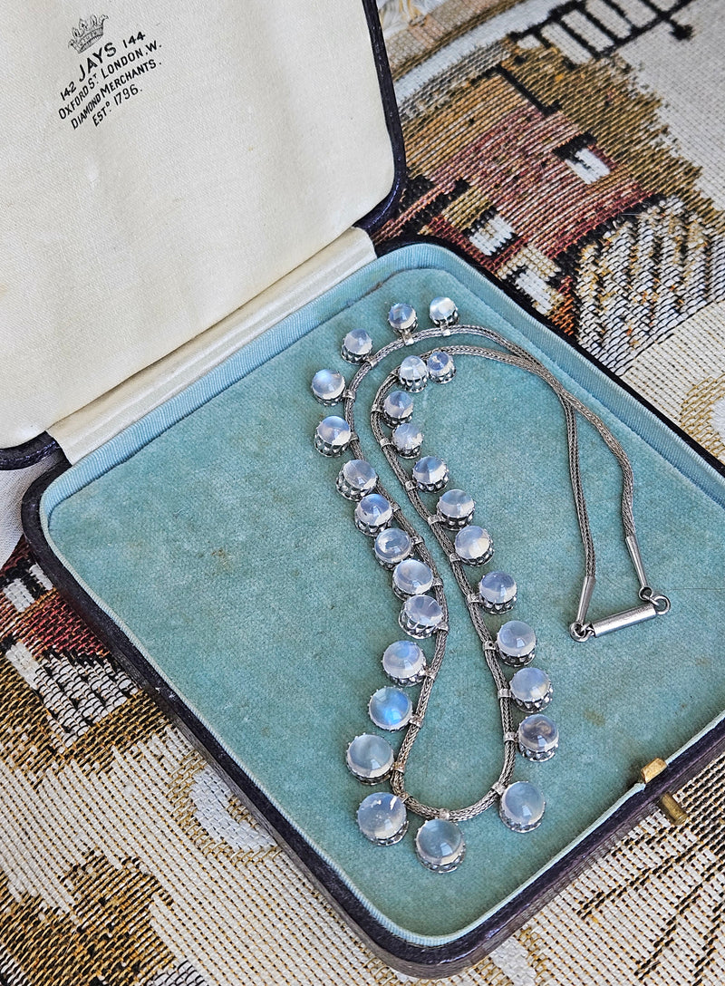 A Victorian Authentic Original Slightly Graduated 23.40ctw Blue Moonstone fringe Roman Woven 10K White Gold Necklace C. 1880s