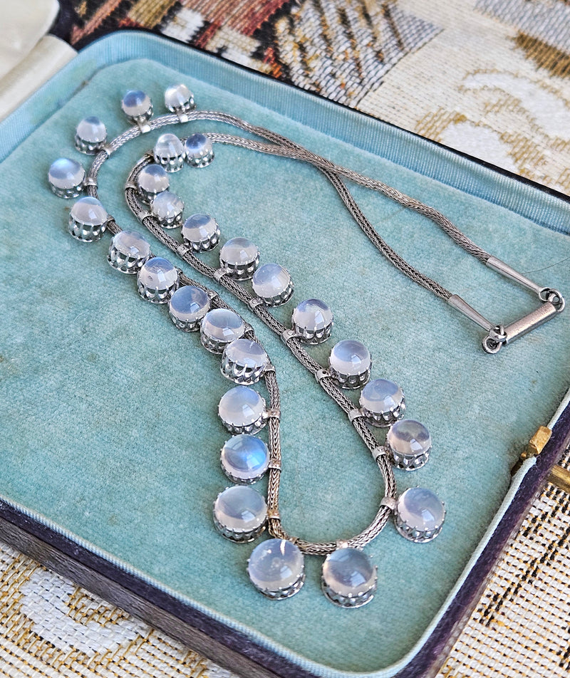 A Victorian Authentic Original Slightly Graduated 23.40ctw Blue Moonstone fringe Roman Woven 10K White Gold Necklace C. 1880s
