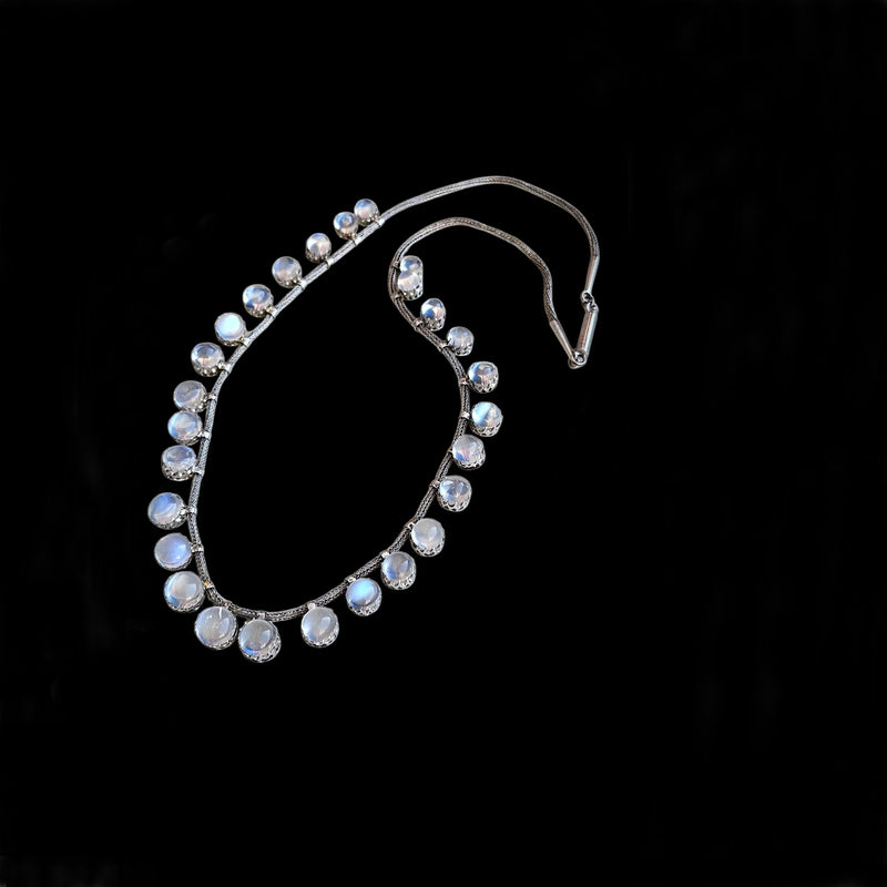A Victorian Authentic Original Slightly Graduated 23.40ctw Blue Moonstone fringe Roman Woven 10K White Gold Necklace C. 1880s