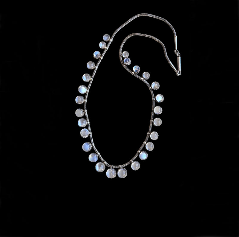 A Victorian Authentic Original Slightly Graduated 23.40ctw Blue Moonstone fringe Roman Woven 10K White Gold Necklace C. 1880s