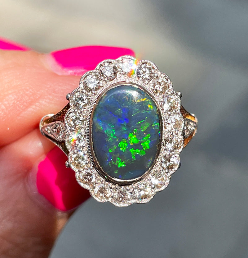 An exquisite Authentic Antique Art Deco Black Opal and