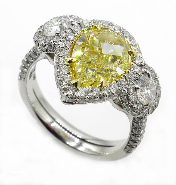 4.10ctw Natural Fancy YELLOW PEAR Shaped Diamond Diamond 3 Stone Halo Pave Platinum RING | Treasurly by Dima - Exquisite Diamonds and Fine Quality Antique, Vintage, and Estate Jewelry