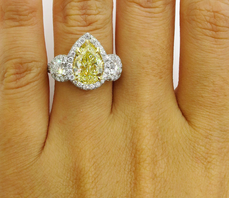 4.10ctw Natural Fancy YELLOW PEAR Shaped Diamond Diamond 3 Stone Halo Pave Platinum RING | Treasurly by Dima - Exquisite Diamonds and Fine Quality Antique, Vintage, and Estate Jewelry