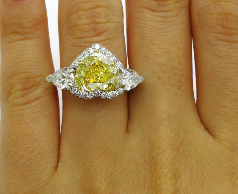 GIA “Canary” 6.16ctw Natural Fancy YELLOW HEART & Pear Shaped Diamond 3 Stone Halo Pave Ring | Treasurly by Dima - Exquisite Diamonds and Fine Quality Antique, Vintage, and Estate Jewelry